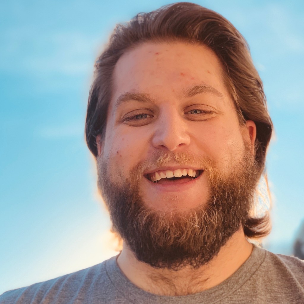 Jake East smiles for a portrait. He is a hazard, kentucky resident involved in appalachian arts alliance building the industry in eastern kentucky