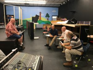 people sit in a circle discussing clean energy economy in kentucky.