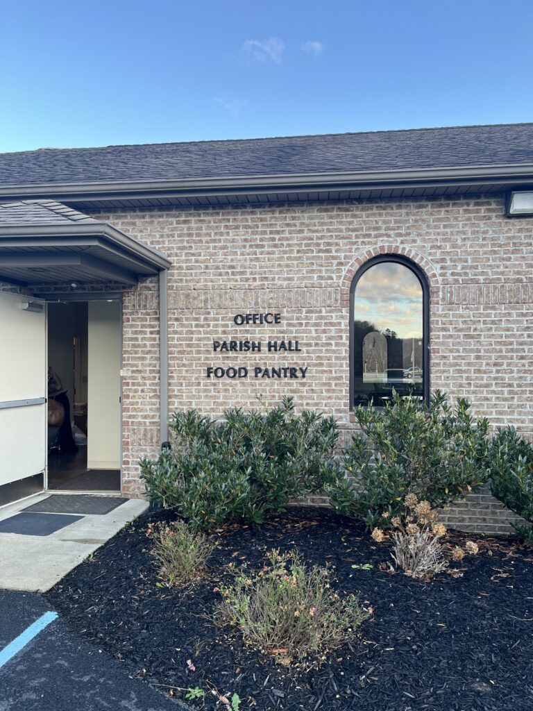 A view of the parish hall and food pantry from the outside of st luke in salyersville, kentucky