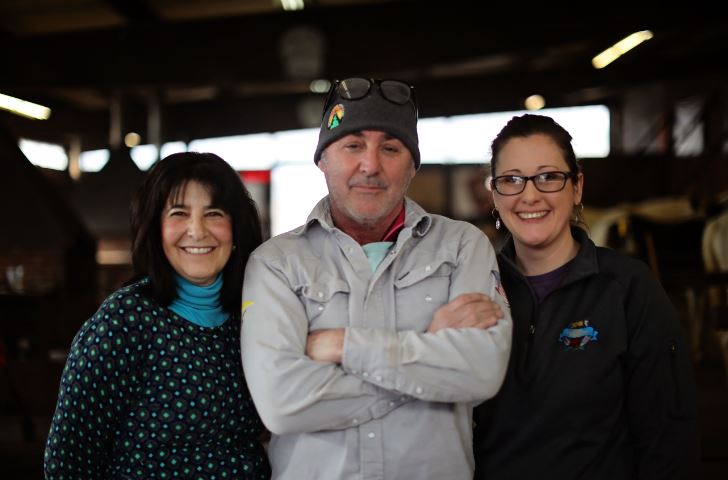Staff smile at the Kentucky Horseshoeing School. MACED provides low interest financing to support the farrier school