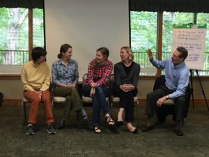 Five people sit in a training at the red river gorge in eastern kentucky.