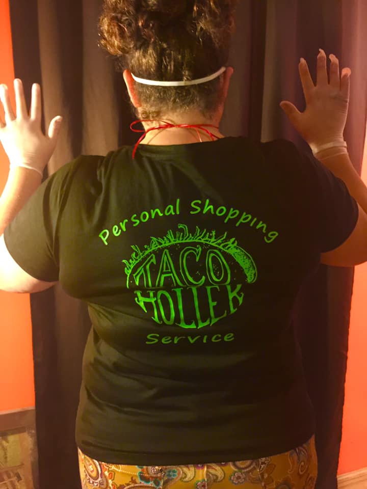 Taco Holler in Harlan Kentucky is owned by Ashley Bledsoe. She is pictured with her COVID-19 mask and gloves.