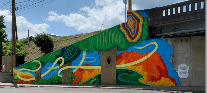 A colorful mural on a bridge in Hazard, Kentucky. This is part of creative placemaking work maced supports in eastern kentucky