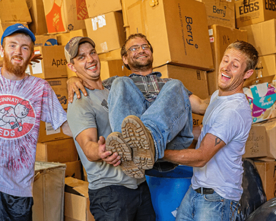 Employees box up clothing and other items at Methodist Mountain Mission in Eastern KEntucky
